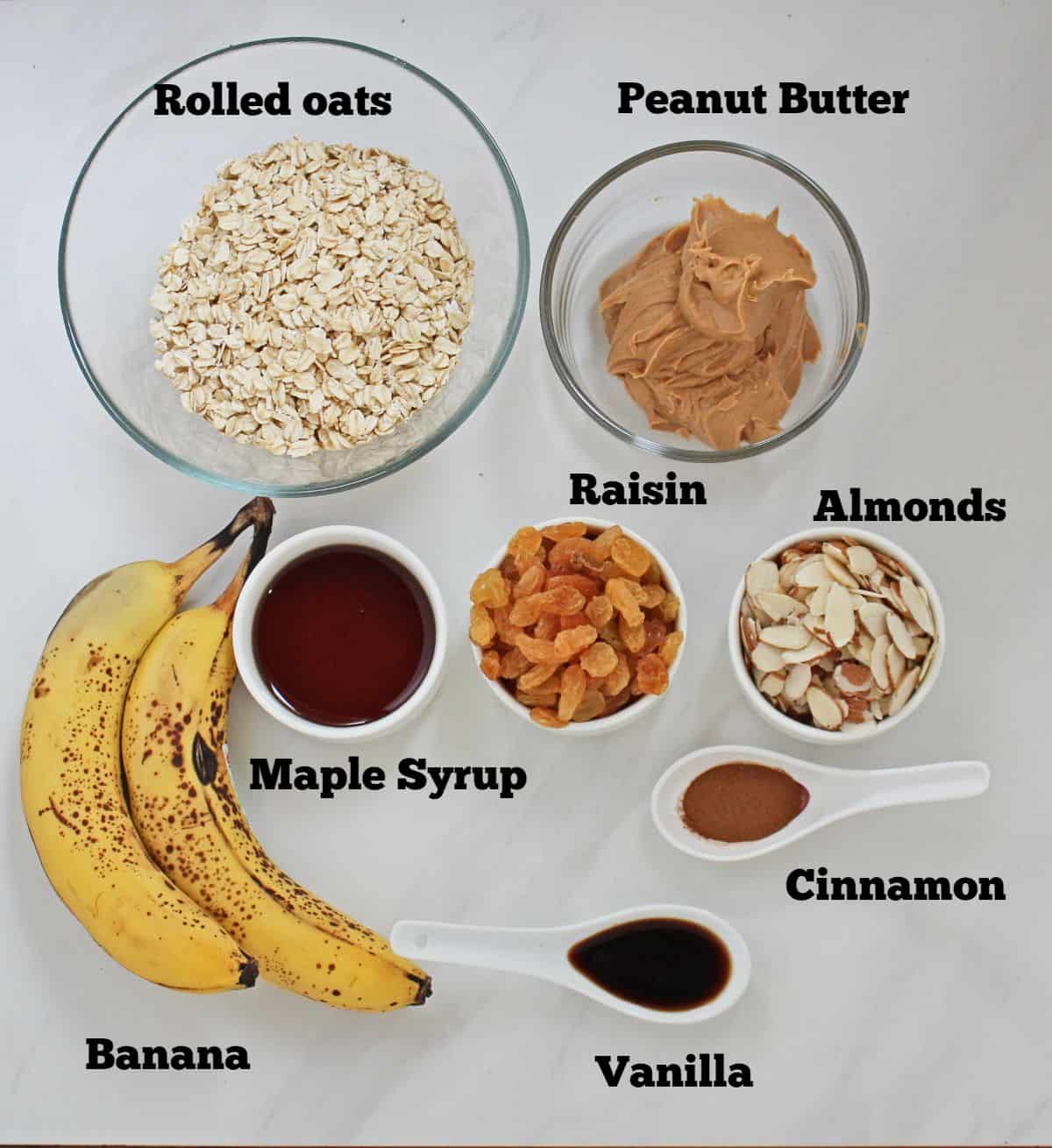 Ingredients needed to make banana oats bar laid out and labeled.