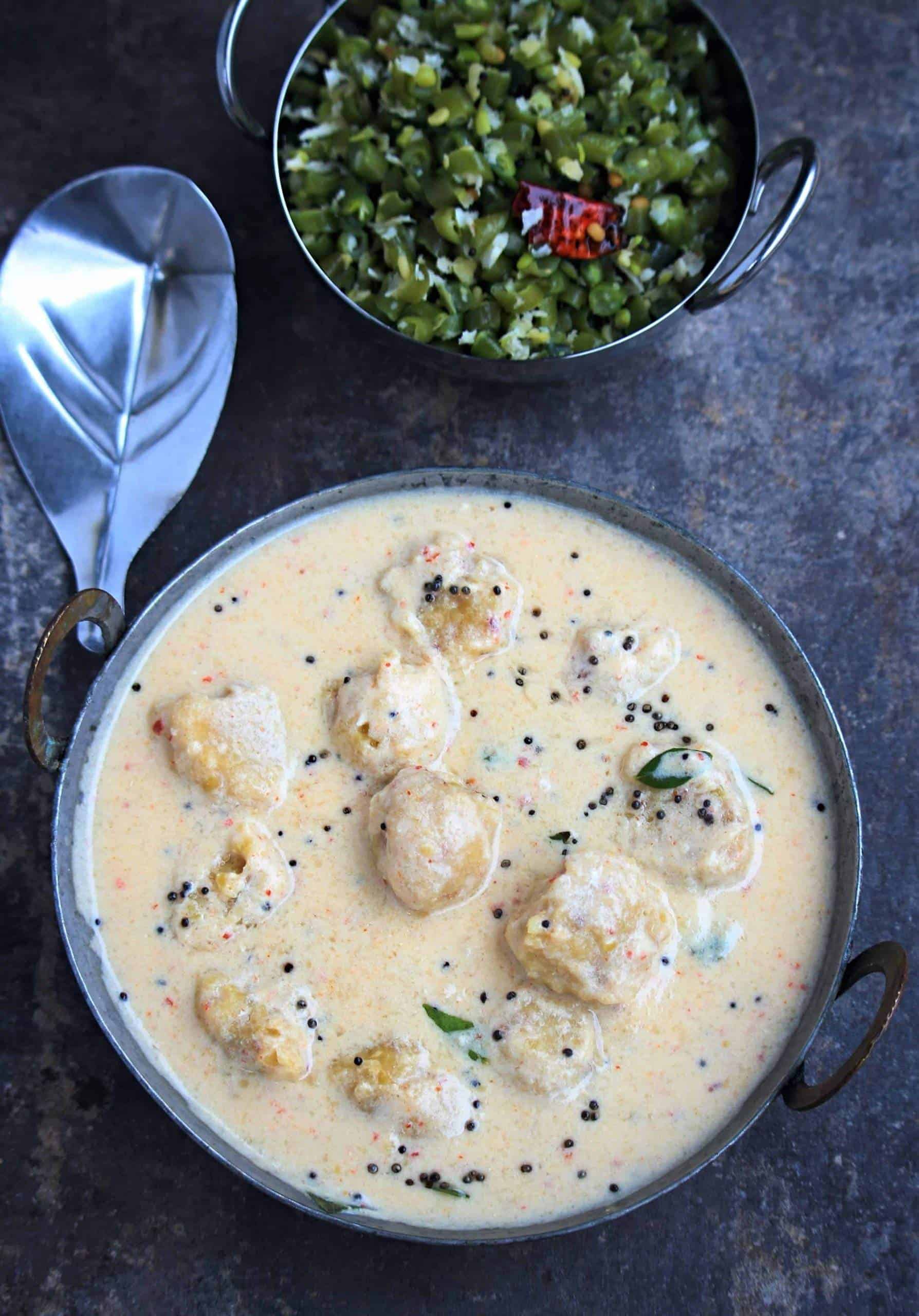 Paruppu Urundai mor kuzhambu Paruppu Urundai mor kuzhambu with beans curry in the side
