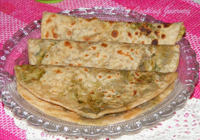 Stuffed 3 methi paratha in a plate